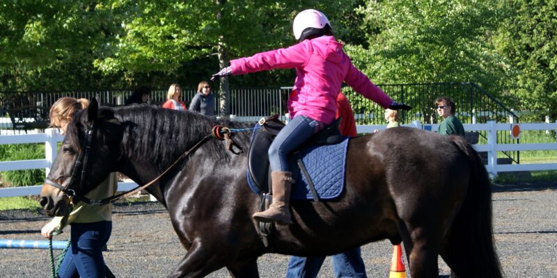 Horse Rider with link to Therapeutic Riding Program page